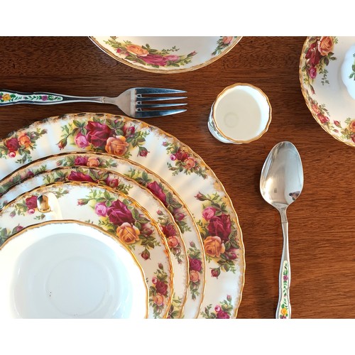 244 - A Royal Albert Country Roses part dinner service, to include 7 dinner plates, 7 side plates, 6 desse... 