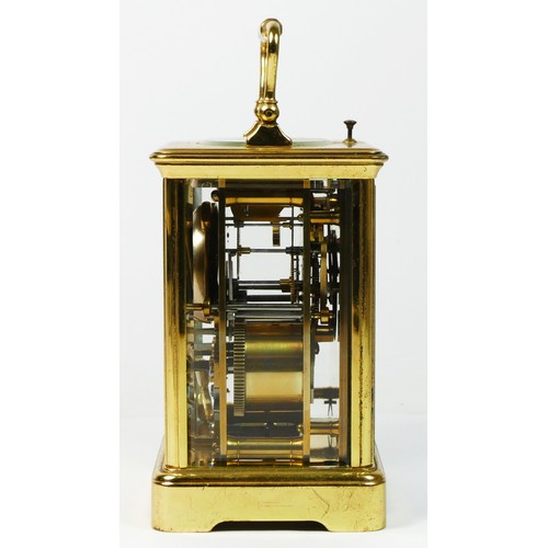 288 - A brass repeating, hour and half hour striking carriage clock, white enamel dial with Roman numerals... 