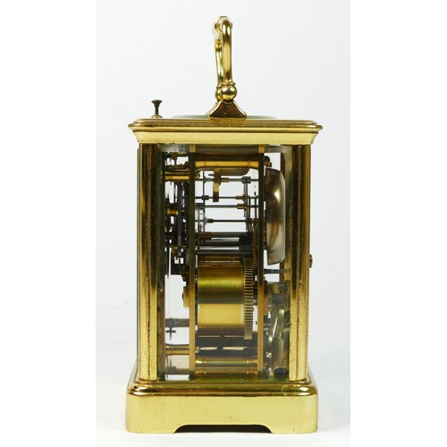 288 - A brass repeating, hour and half hour striking carriage clock, white enamel dial with Roman numerals... 