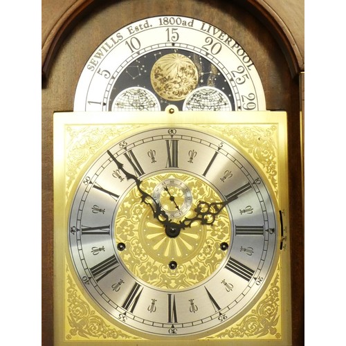 291 - A modern Westminster chime longcase clock by Sewills, the mahogany case with brass dial embossed gil... 