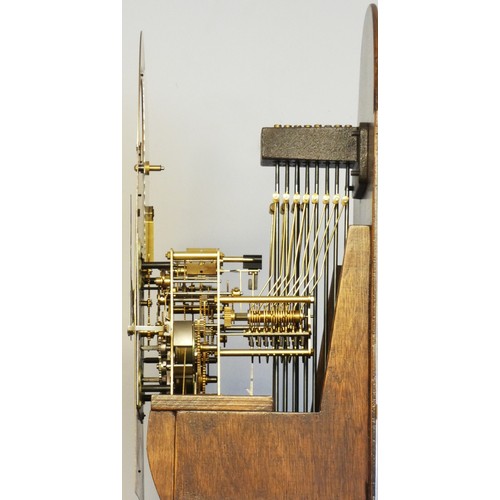 291 - A modern Westminster chime longcase clock by Sewills, the mahogany case with brass dial embossed gil... 