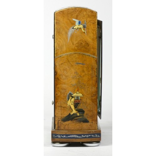 293 - A 1920's Art Deco English Chinoiserie mantel clock, having a silvered dial with arabic numerals and ... 