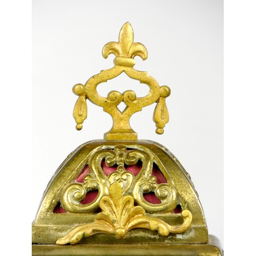 295 - An early 20th century gilt brass Ormolu mantel cock, the elaborate case scroll decoration, cast dial... 