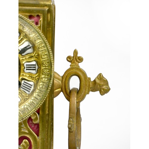 295 - An early 20th century gilt brass Ormolu mantel cock, the elaborate case scroll decoration, cast dial... 