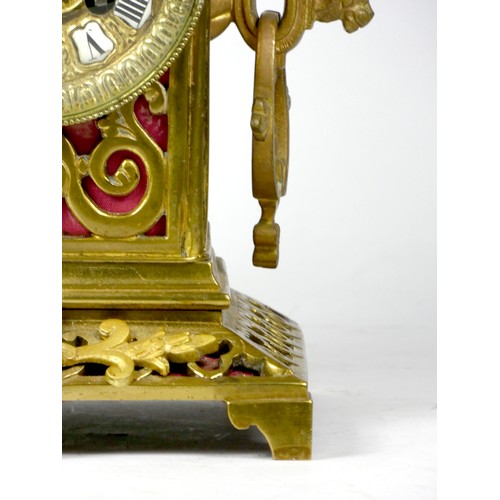 295 - An early 20th century gilt brass Ormolu mantel cock, the elaborate case scroll decoration, cast dial... 