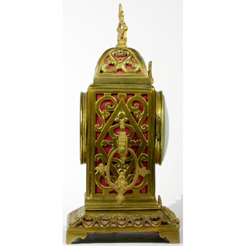 295 - An early 20th century gilt brass Ormolu mantel cock, the elaborate case scroll decoration, cast dial... 