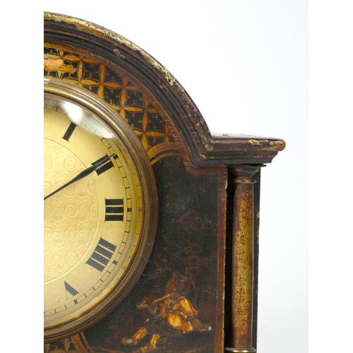 299 - An early 20th century arched mantel clock, gilt brass dial with roman numerals, in a gilded black la... 