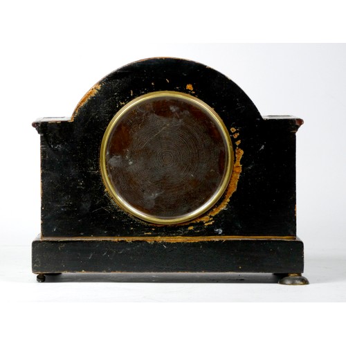 299 - An early 20th century arched mantel clock, gilt brass dial with roman numerals, in a gilded black la... 