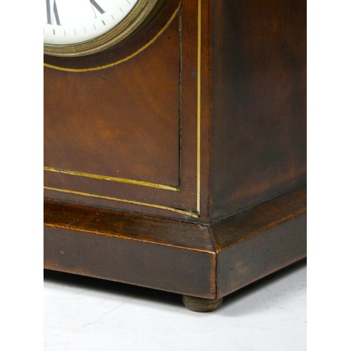 300 - An Edwardian mahogany mantel clock, the white enamelled dial with Roman numerals and brass bezel, ha... 