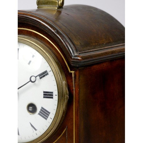 300 - An Edwardian mahogany mantel clock, the white enamelled dial with Roman numerals and brass bezel, ha... 