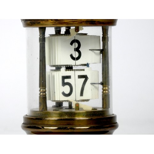 305 - A U.S.A 'Ever-Ready' ticket desk clock, the brass case of cylindrical form with moulded top and bott... 