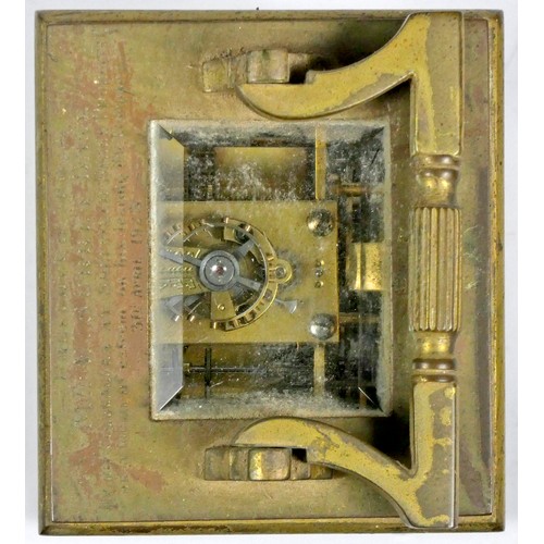 306 - A French carriage clock, of rectangular form having enamelled dial with Roman numerals, the brass ca... 