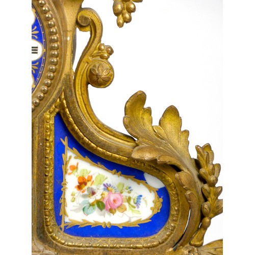 307 - A Louis XVI style gilt metal and sevres porcelain inset mantel clock, late 19th early 20th century, ... 