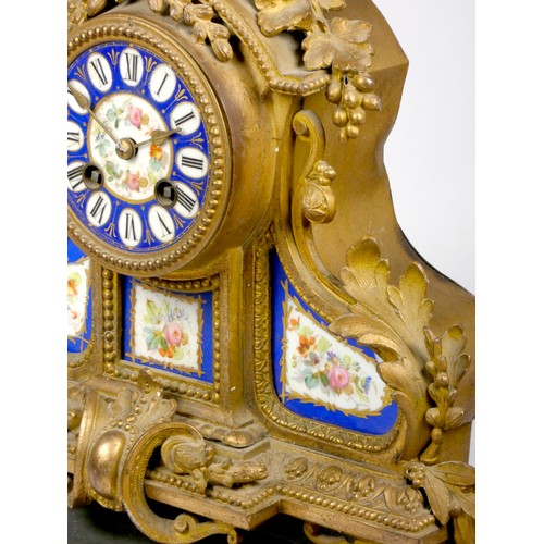 307 - A Louis XVI style gilt metal and sevres porcelain inset mantel clock, late 19th early 20th century, ... 