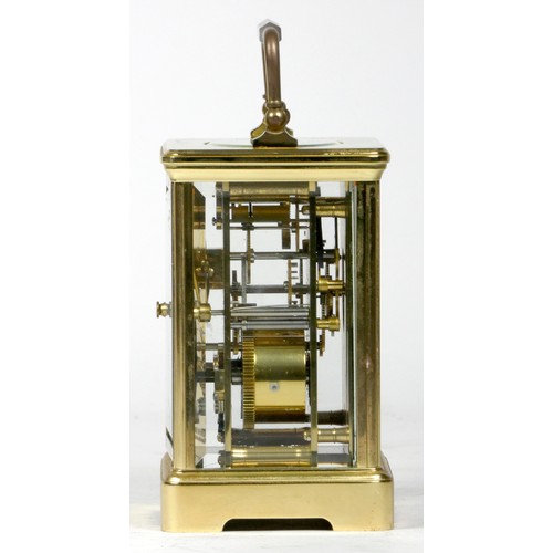 309 - A French brass carriage clock, of rectangular form, the enamelled dial with Roman numerals and inscr... 