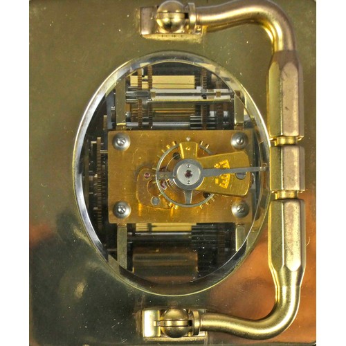 309 - A French brass carriage clock, of rectangular form, the enamelled dial with Roman numerals and inscr... 