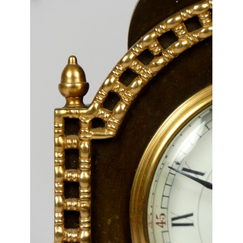 314 - An early 20th century French mantel clock, having arched top with burnished brass case and attached ... 