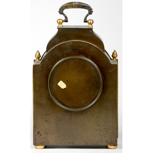 314 - An early 20th century French mantel clock, having arched top with burnished brass case and attached ... 