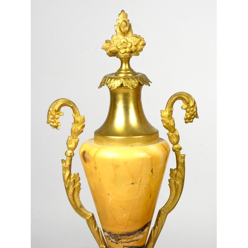 317 - A French Empire mid-19th century marble and gilt brass mounted clock garniture having an eight-day d... 