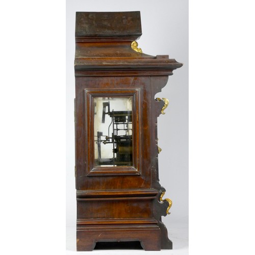 318 - A late 19th early 20th Century German mahogany cased bracket clock, the break-arched dial with silve... 