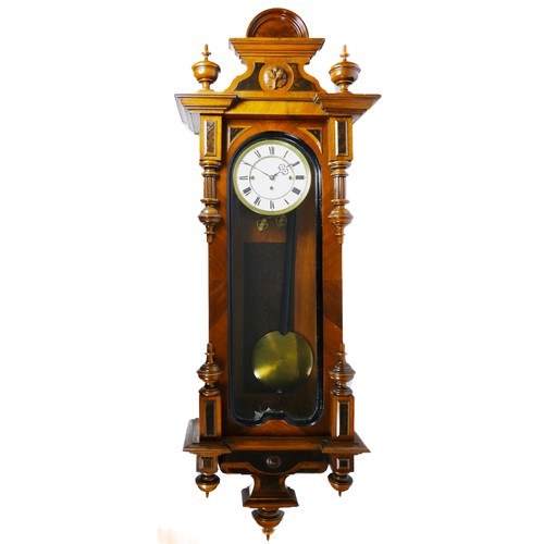 A late 19th century mahogany Vienna regulator wall clock inlaid