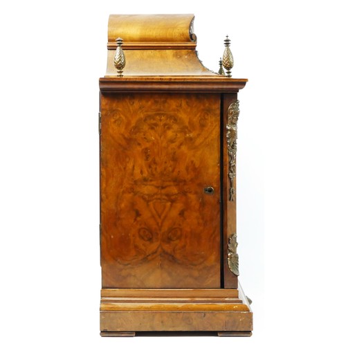 321 - A Victorian mahogany and burr walnut German bracket clock, the bell-top case above four urn finials ... 