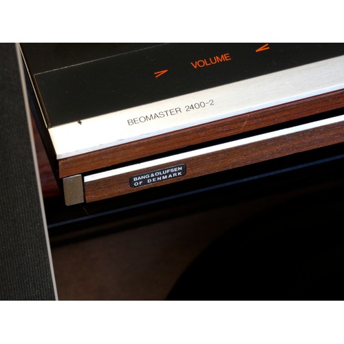 362 - A Bang & Olufsen sound system, to include a Beomaster 2400-2 amplifier with built in tuner, a Beocor... 