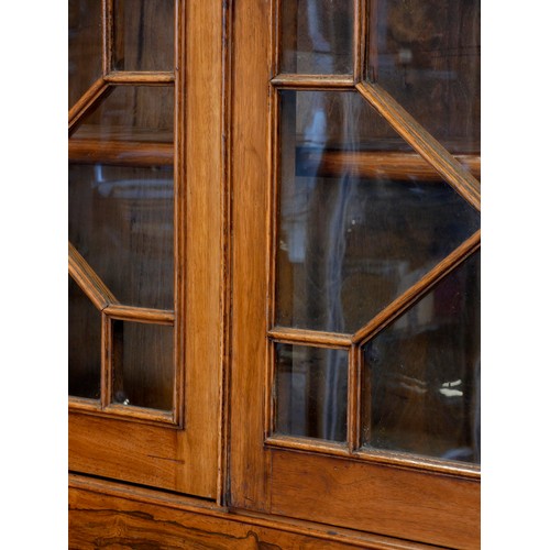 379 - A Victorian rosewood & mahogany bureau desk having a twin door bookcase top with optional top sectio... 