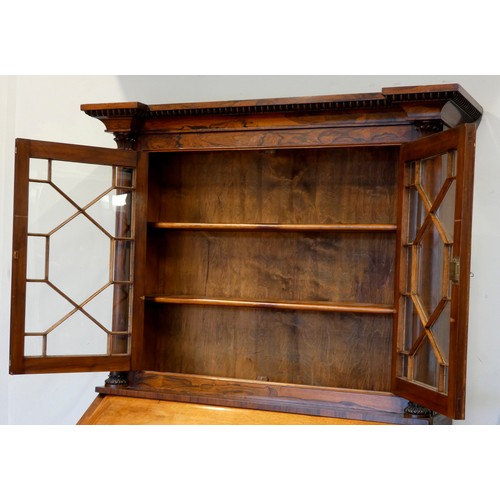 379 - A Victorian rosewood & mahogany bureau desk having a twin door bookcase top with optional top sectio... 