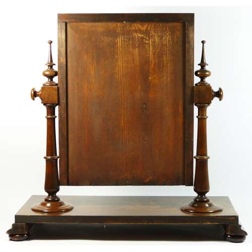 391 - A Victorian mahogany swing mirror, with turned supports, 60 x 61cm.