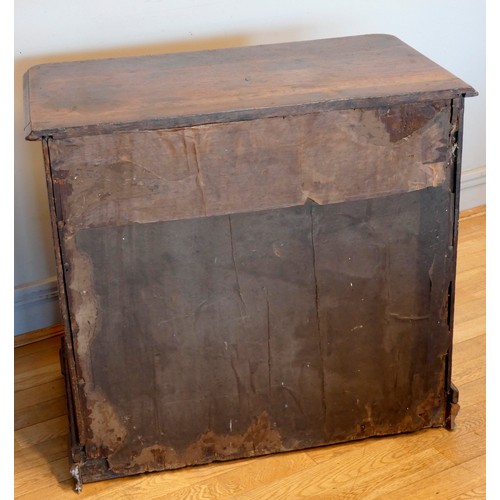 395 - A 19th century oak and parquetry inlay chest of drawers, having thumbnail edged top, over two short ... 