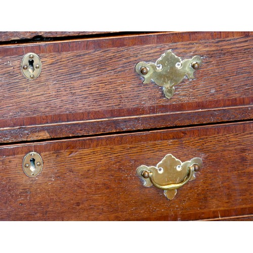 395 - A 19th century oak and parquetry inlay chest of drawers, having thumbnail edged top, over two short ... 