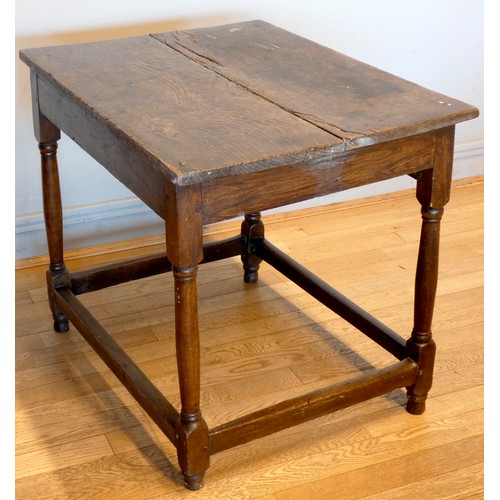 402 - An early 18th century lowboy, the two plank moulded top over a single frieze drawer with brass drop ... 