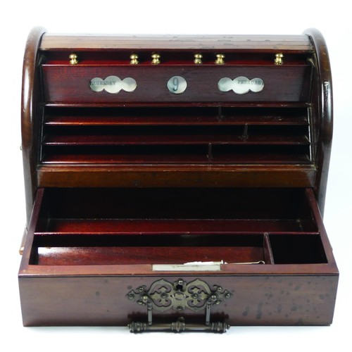 154 - A Victorian mahogany roll-top stationery box, the top rolls back to reveal fitted interior, with int... 