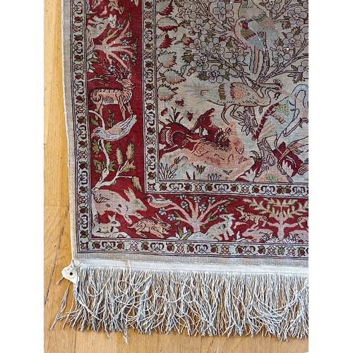 155 - A Persian Kashan silk birds of paradise prayer rug, the field with a tree of life, the border with a... 