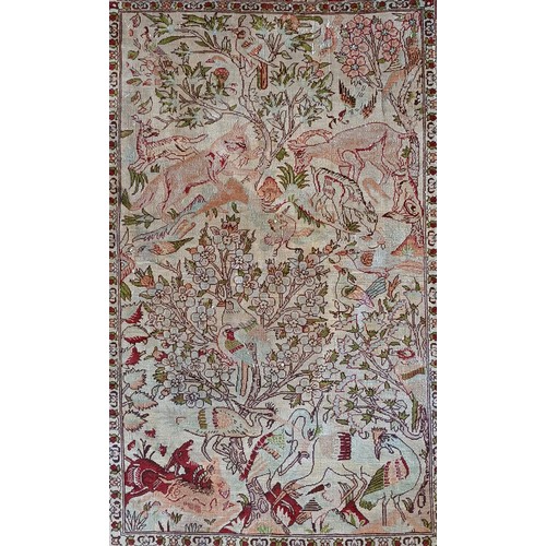 155 - A Persian Kashan silk birds of paradise prayer rug, the field with a tree of life, the border with a... 