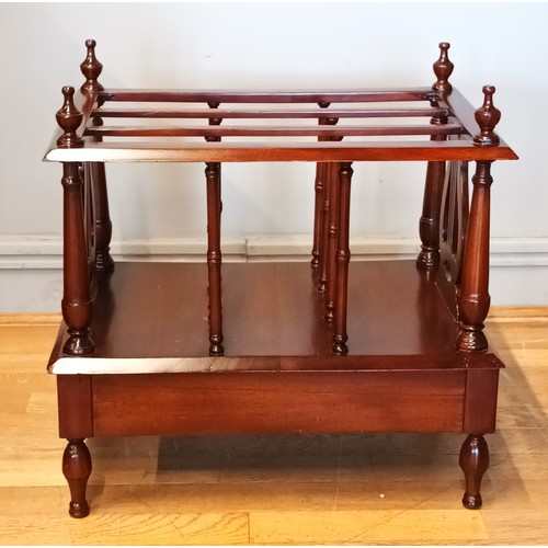 398 - A Regency style mahogany canterbury, having three dipped divisions above a frieze drawer raised on t... 