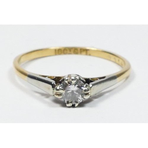 68 - An 18ct gold and platinum single stone diamond ring, claw set with a brilliant cut stone weighing ap... 