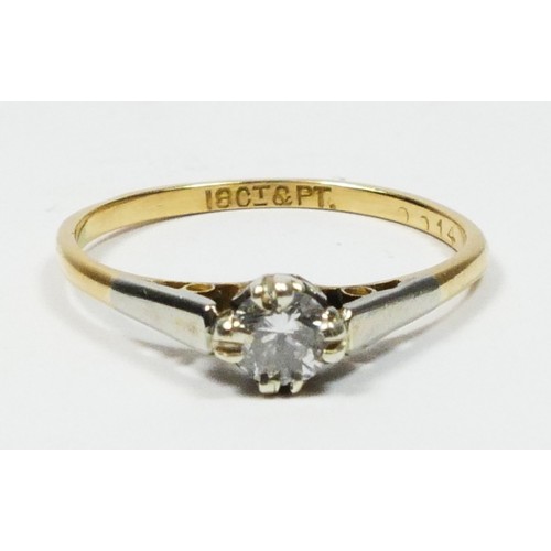 68 - An 18ct gold and platinum single stone diamond ring, claw set with a brilliant cut stone weighing ap... 