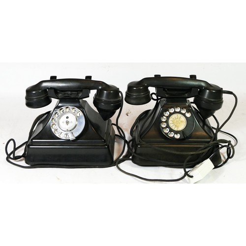 A pair of early 20th century telephones, black bakelite case converted to modern day use.