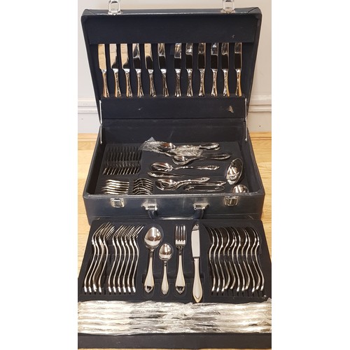 A Suissine 96 piece canteen of cutlery complete in fitted Hitachi