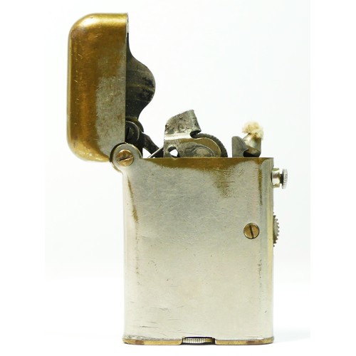 Thorens, a Teleflame petrol lighter.