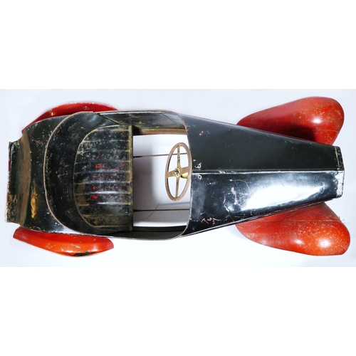 42 - Eureka Super Junior 35 child's pedal car, c.1935-38, metal body painted in red over black, metal dis... 