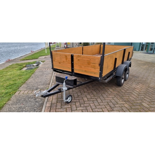 135 - A twin axle unbraked trailer with lighting board and ladder rack, Internal dimensions, 144 x 295cm