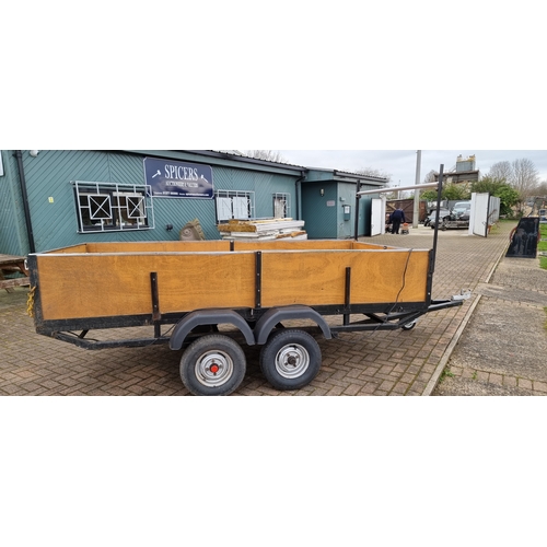 135 - A twin axle unbraked trailer with lighting board and ladder rack, Internal dimensions, 144 x 295cm