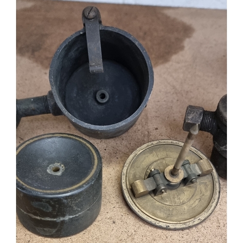 70 - Two S. Smith & Sons brass carburettor float bowls and two fuel filters