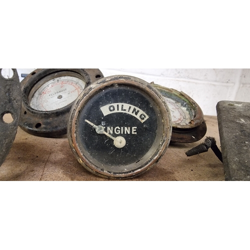 74 - Two Telegauge petrol gauges, an Engine Oiling gauge, a CAV voltmeter and ampere gauge and another am... 