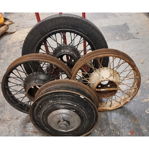 68 - Three vintage wire wheels, one with a 3 1/2