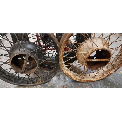 68 - Three vintage wire wheels, one with a 3 1/2