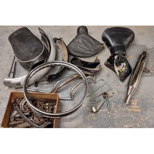 100 - An autojumblers lot, to include a Lambretta Innocenti rear seat, and a prewar British seat